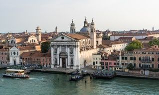 canal with boats in venice