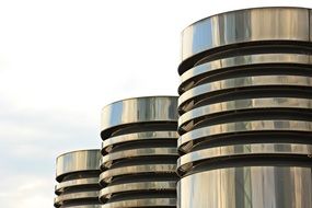 Three metal Chrome columns