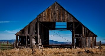 Old Wooden Barn and mountains