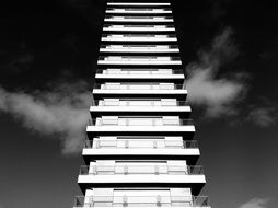 the balconies of the skyscraper a black and white photo