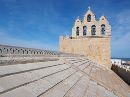 bell tower on the roof of a church in france