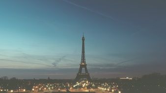 eiffel tower in lights at night, france, paris