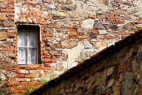 window on an old brick building