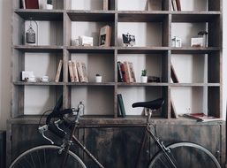 Bicycle near the shelves