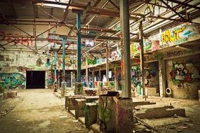 abandoned factory covered with graffiti