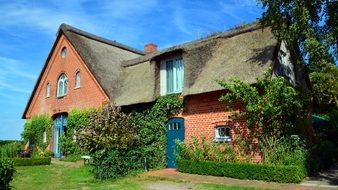 Rural cottage with a thatched roof