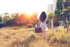 girl with the basket is walking