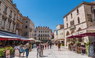 Tourists in the streets of the old city in Europe