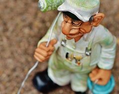 small statue of painter working