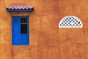 blue window shutters in Spain