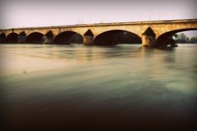 old stone bridge at sunrise