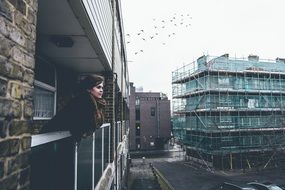 Woman on Balcony