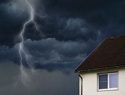 thunderclouds above the house