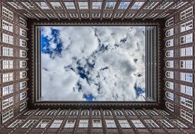 historic building in hamburg and cloudy sky