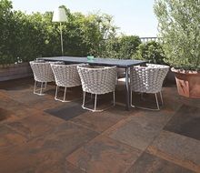 table with chairs on the tiled floor