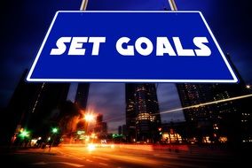 ser goals, motivator at night cityscape, collage