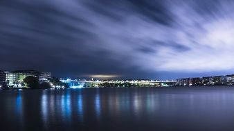 night city is reflected in the water