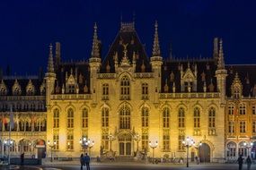 night illumination of the town hall in Bruges, Belgium