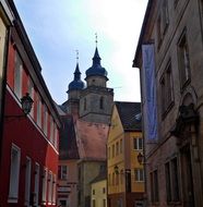 city church between buildings in bavaria