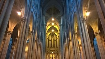 lighting in the interior of a gothic cathedral