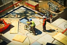 tilt shift picture of construction work