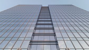 skyscraper in the city center with a glass facade