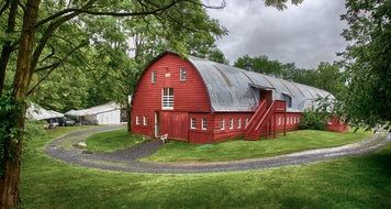 big red barn on a ranch