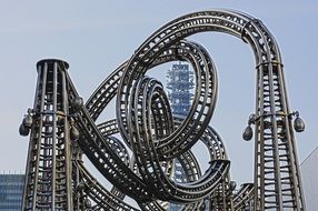 roller coaster in japanese cityscape