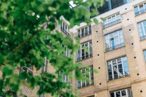 Building behind a tree