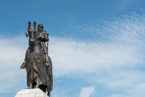 a medieval statue of Robert Bruce on a horse in Scotland