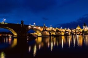 night illumination of Charles bridge in the Czech Republic