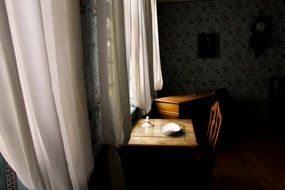table near the window in the guest house