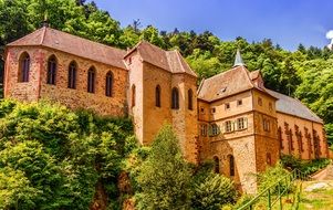 monastery among green trees