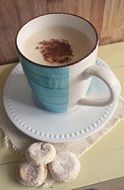 cup with coffee on a saucer