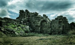 thunderclouds over ruins on turkish riviera