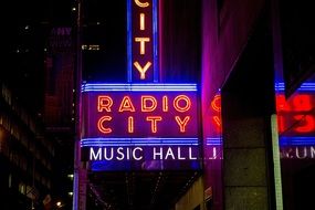 colorful neon street sign of Radio City Music Hall, usa, manhattan, new york city