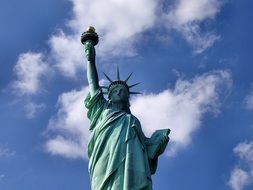 statue of liberty in the clouds