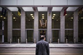 office worker in front of the building