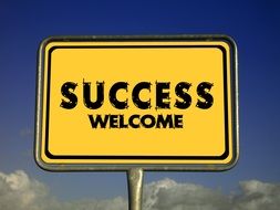 welcome success road sign