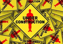 under construction yellow sign