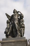 sculpture of woman with two child girls in germany, Dresden