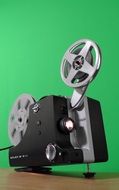 projector against a green wall