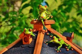 Green frog toys on the home