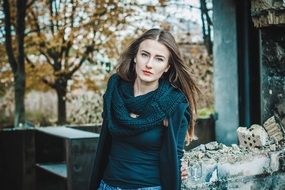 beautiful lady near abandoned building