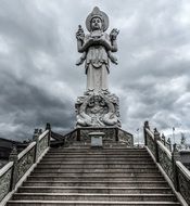 staircase near the sculpture of the goddess