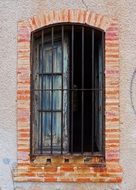 brick window in an abandoned building