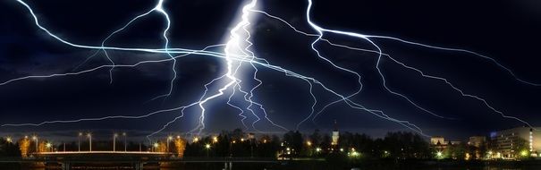 lightning flashes and storm over the city