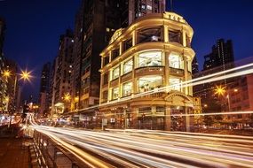 light trail near the building at night