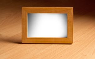 wooden photo frame on the table