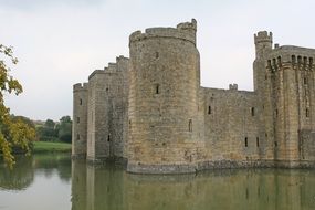 castle stands on the water in england